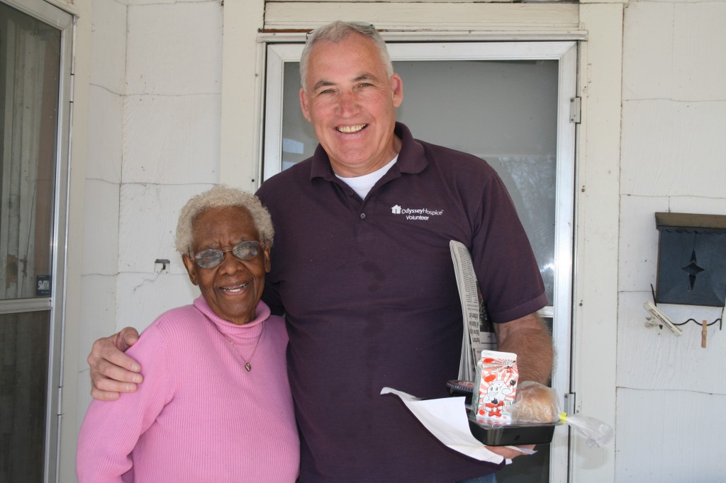 volunteer delivers meal